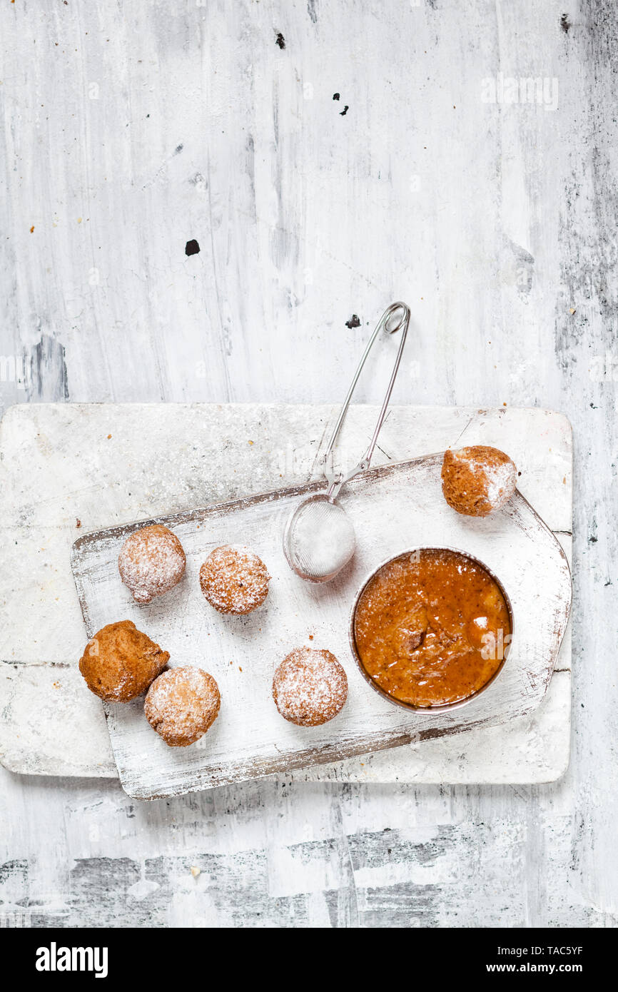 Donut holes with caramel sauce Stock Photo