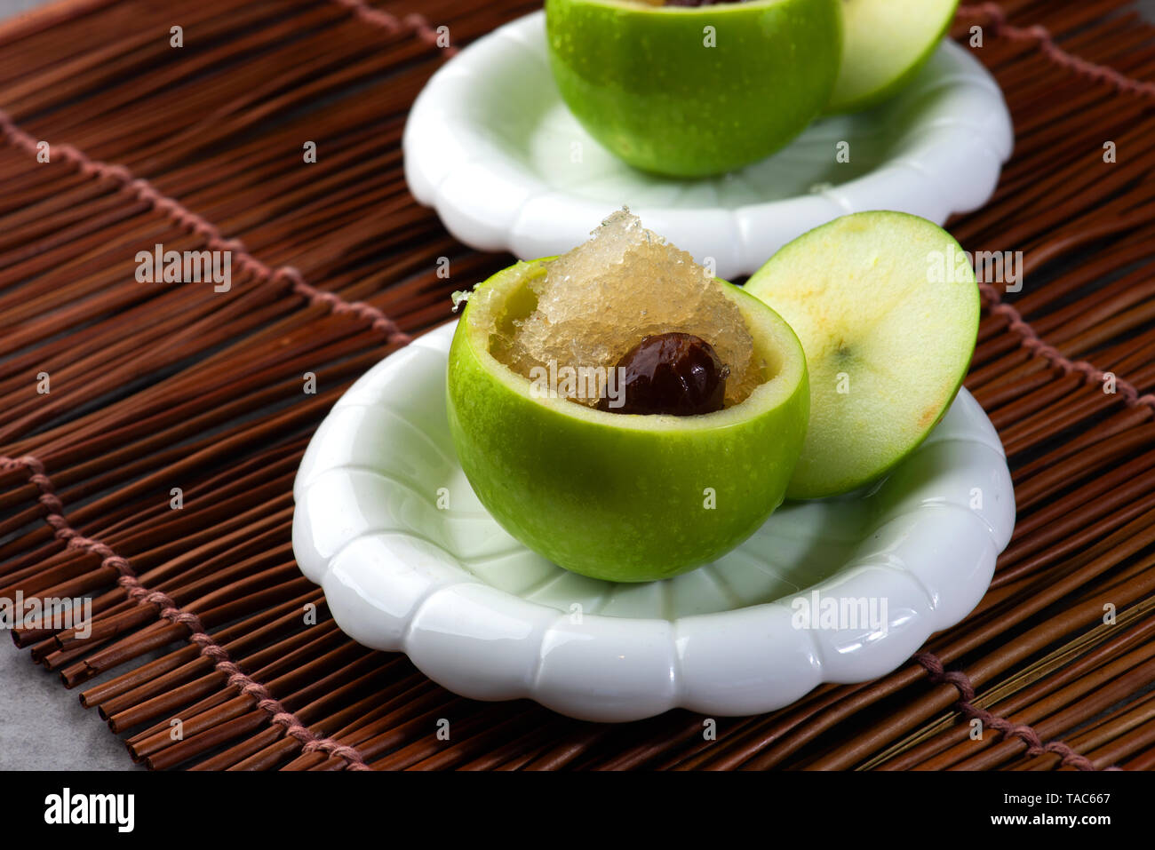 Edible bird's nest soup in an apple Stock Photo Alamy