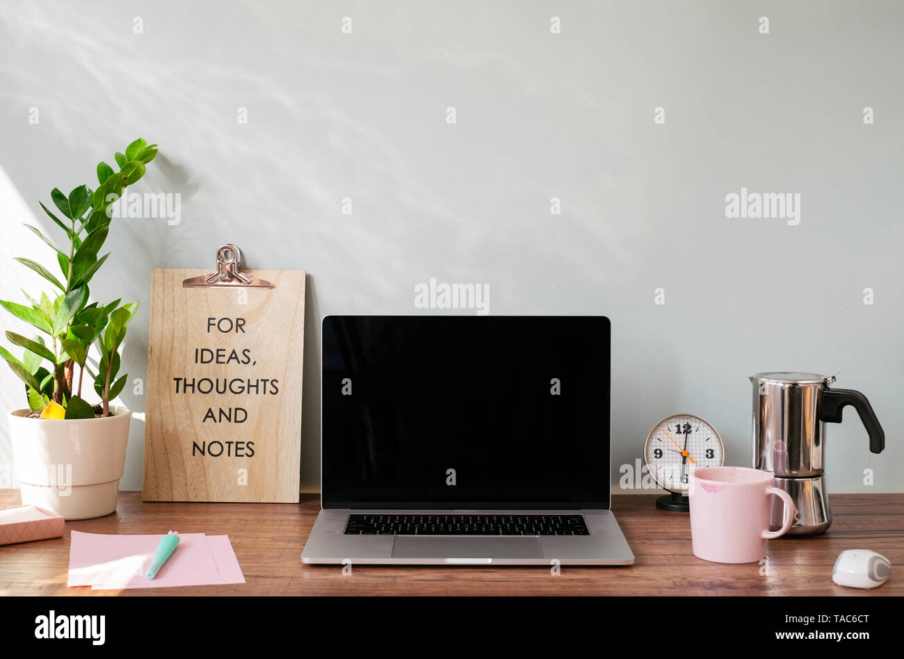 Desk with laptop at home office Stock Photo Alamy