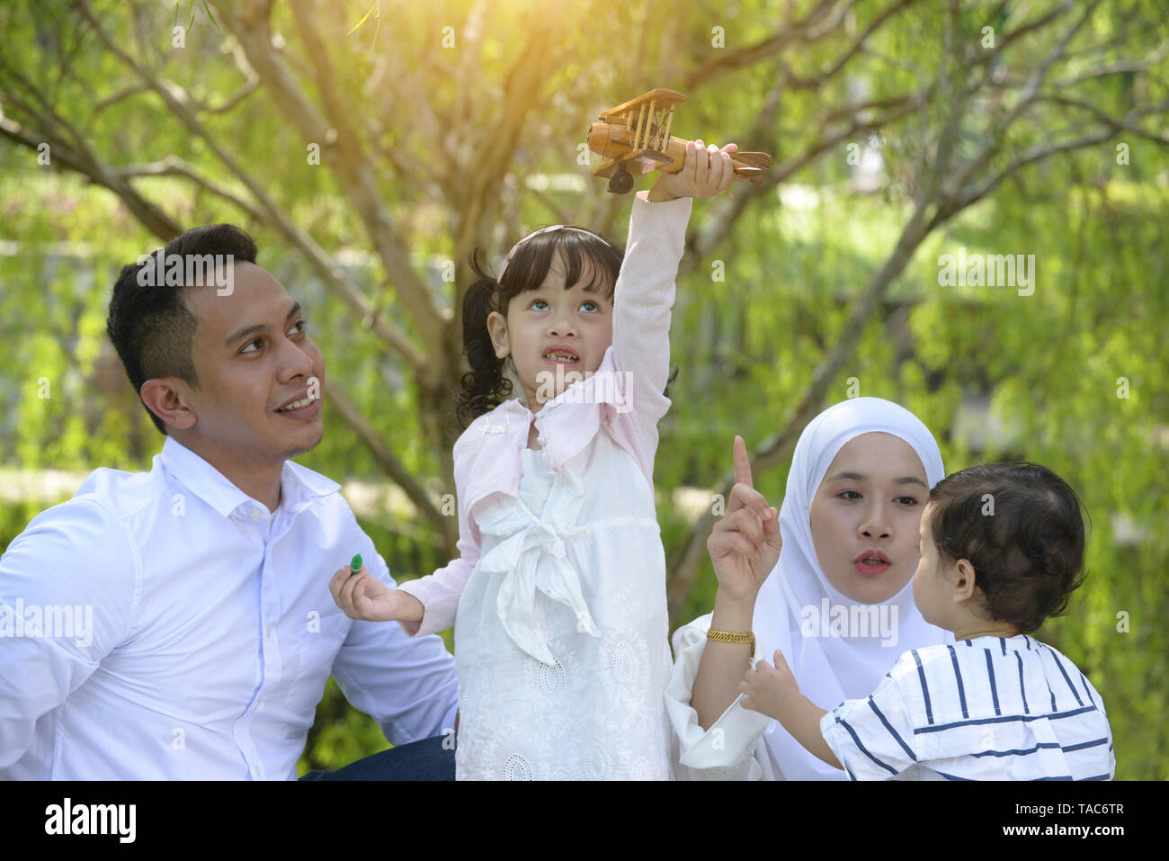 Malay Family Having Quality Time In A Park With Morning Mood Stock Photo Alamy