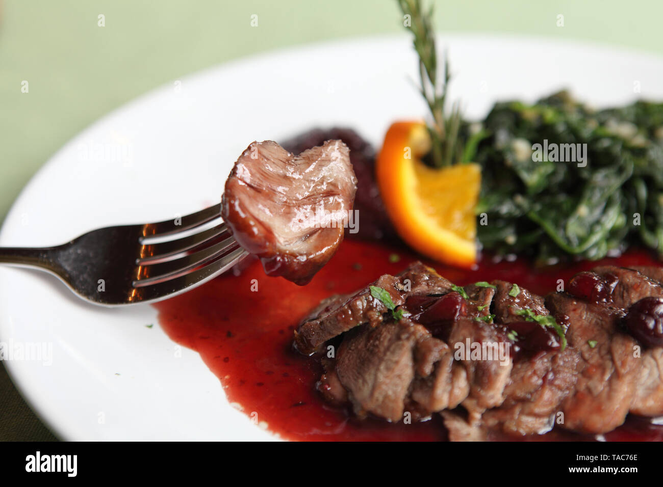 Duck confit , Roasted duck with blueberry sauce Stock Photo - Alamy