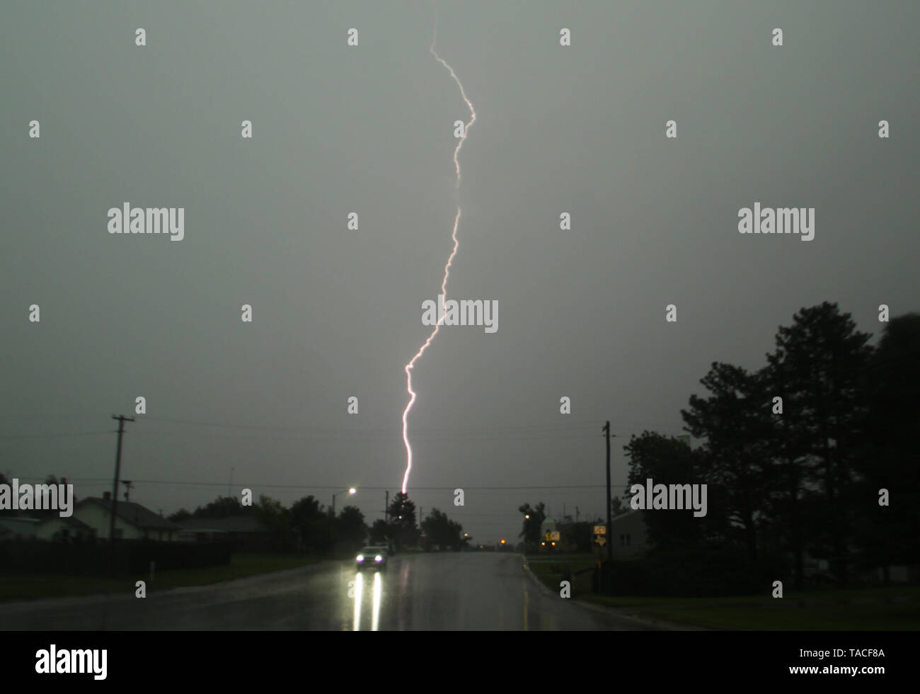 Lightning strikes from tornado warn storm cells in Booker Texas