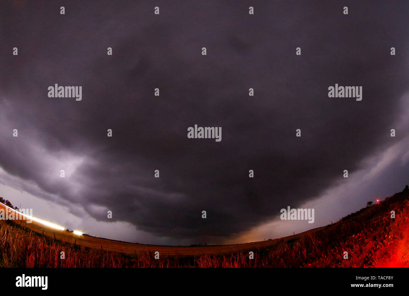 A wedge tornado storm cells cross over and misses the town of Laverne
