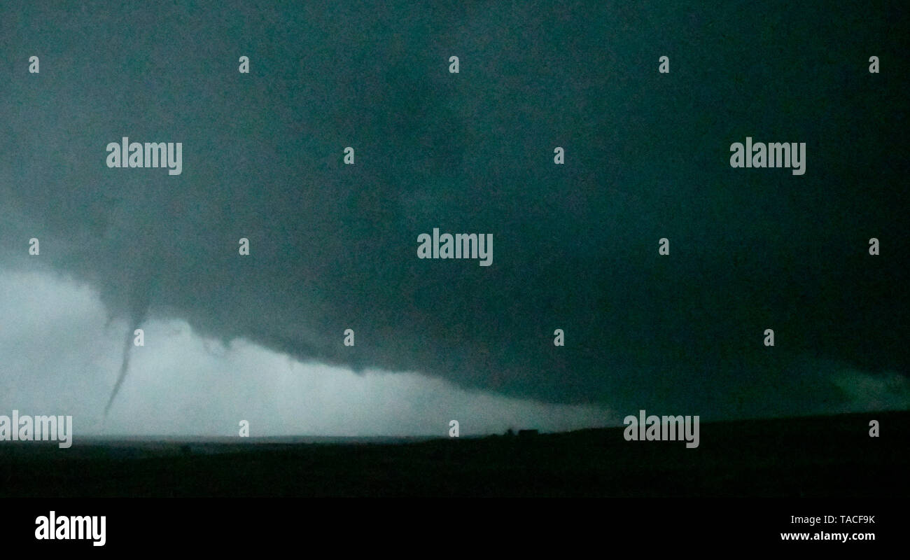 A wedge tornado storm cells cross over and misses the town of Laverne