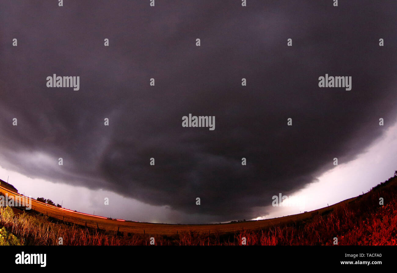 A wedge tornado storm cells cross over and misses the town of Laverne