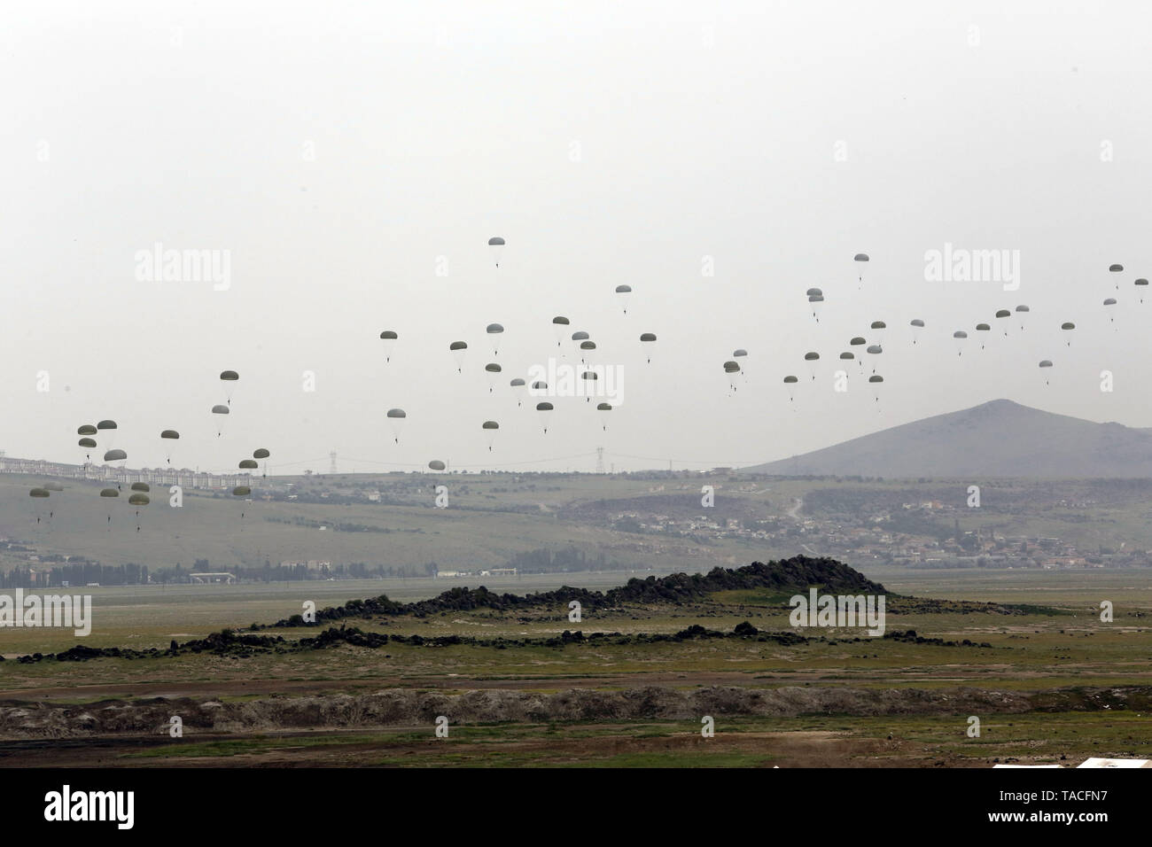 (190524) -- ANKARA, May 24, 2019 (Xinhua) -- Paratroopers take part in the 'Erciyes-2019' military drill in Keyseri, Turkey, on May 23, 2019. An international joint military drill named 'Erciyes-2019' was completed in Turkey's central province of Keyseri, Turkish National Defense Ministry announced on Thursday.     The drill conducted between May 6-23 was participated by seven allied countries, including Azerbaijan, the United States, Romania, Georgia, Pakistan, Qatar and Italy, the ministry said in a video posted on its website. (Xinhua) Stock Photo