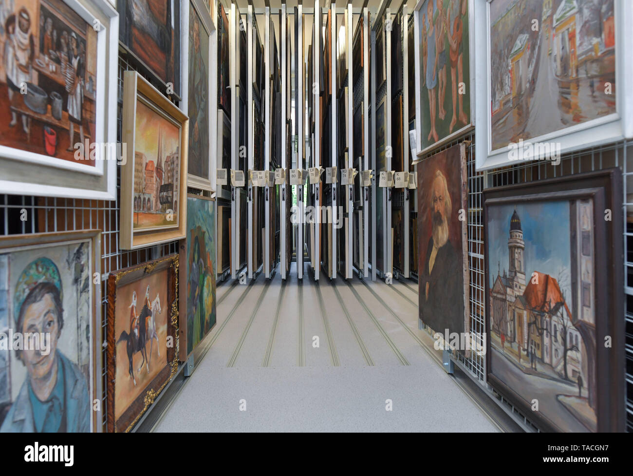 20 May 2019, Brandenburg, Beeskow: View into the "heart" of the new art  archive with its innumerable pulling grids to which pictures from GDR times  are attached. 30 years after the fall
