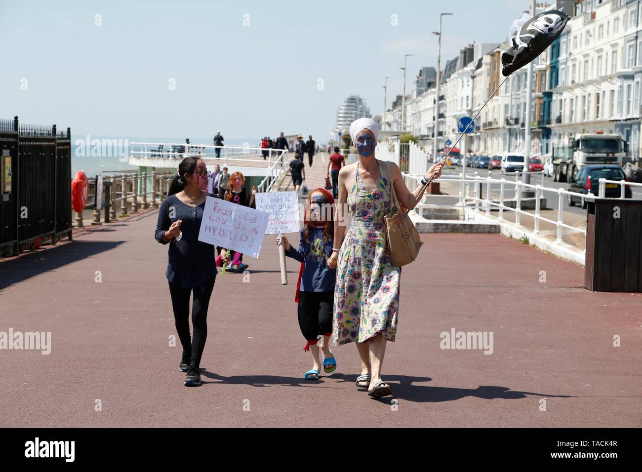 Hastings, East Sussex, UK. 24 May, 2019. Climate change: Approximately 150 young people aged from toddlers with parents and 18 year old students have taken to Hastings promenade to demand action for change. Lots of youths walk along the Hastings seafront shouting and waving placards regarding the current situation. Photo Credit: Paul Lawrenson/Alamy Live News Stock Photo