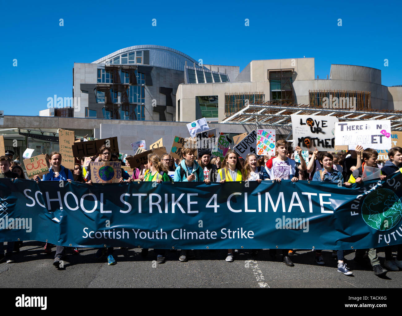Edinburgh, Scotland, UK. 24th May, 2019. Scottish Youth Climate Strike by schoolchildren in central Edinburgh. Students took a day off school to meet in The Meadows park before marching along the Royal Mile to a protest held outside the Scottish Parliament at Holyrood. The protest is to coincide with the second global school strike for climate - along with over 1500 locations around the world. The strikes were started in August 2018 by the Swedish schoolgirl Greta Thunberg and have since been mirrored across the world.    Credit: Iain Masterton/Alamy Live News Stock Photo