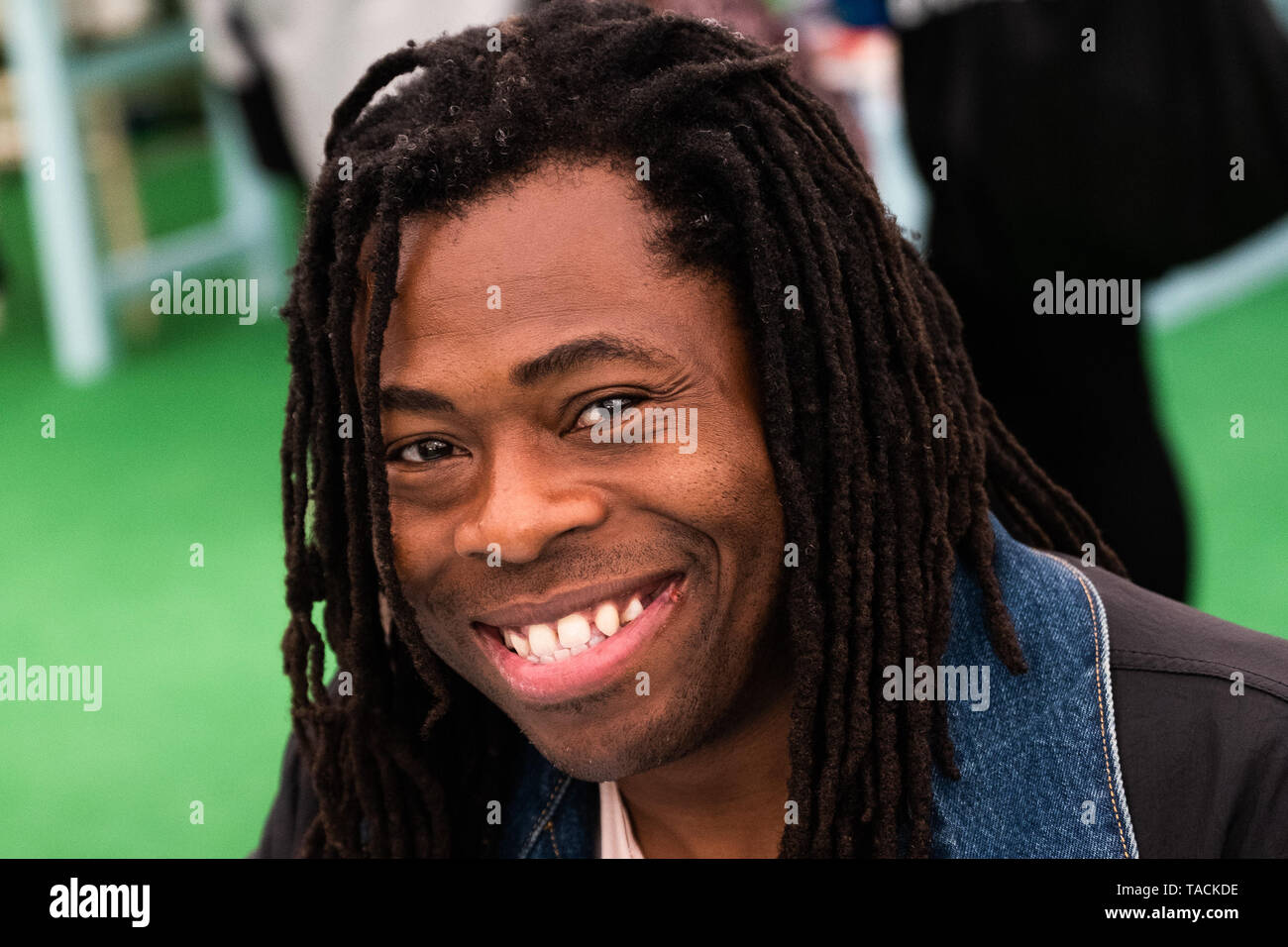 The Hay Literature Festival, Hay on Wye, Wales UK Friday 24 May 2019.   ADE ADEPITAN , wrier, in the bookshop after giving his talk to secondary school pupils  on the 2nd day of the 32nd annual Hay Festival of Literature and the Arts.  The festival attracts the finest writers and thinkers from  across the globe for 10 days of celebration of the best of the written word and critical debate  Photo © Keith Morris / Alamy Live News Stock Photo