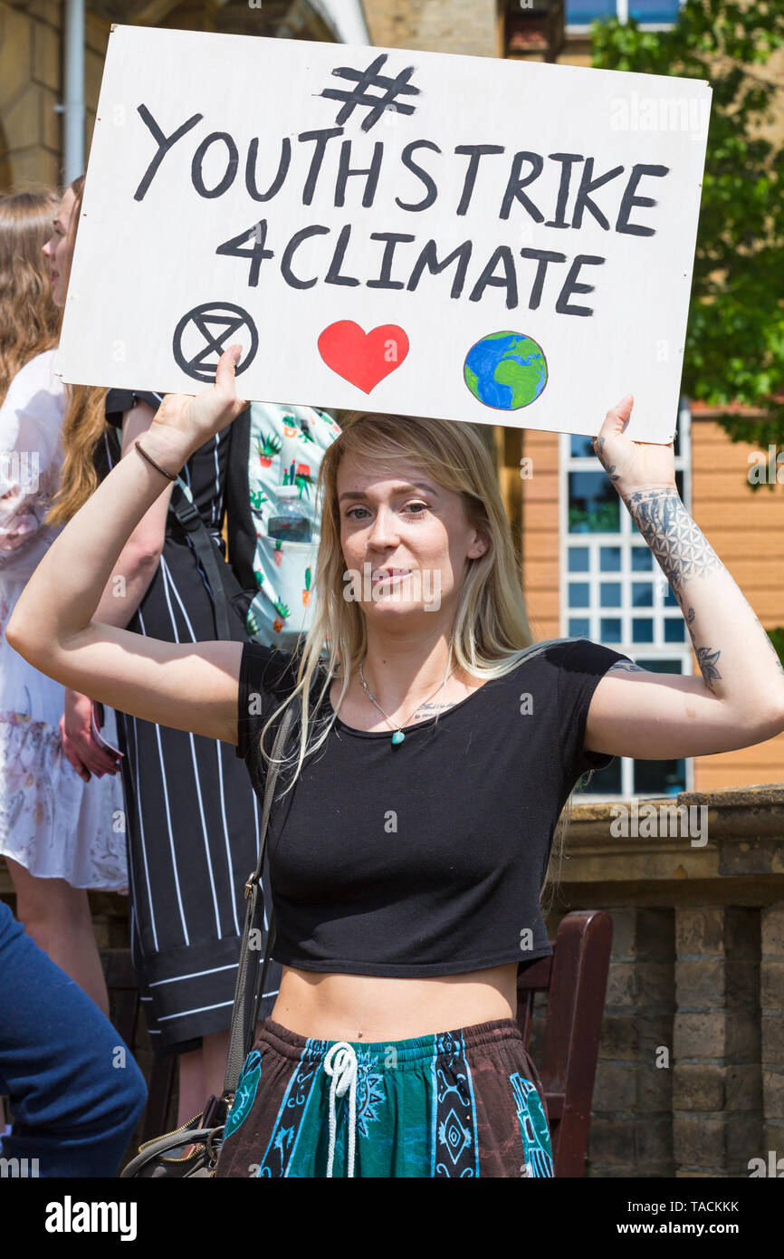 Bournemouth, Dorset, UK. 24th May 2019. Youth Strike 4 Climate gather in Bournemouth Square with their messages about climate change, before marching to the Town Hall.  Youthstrike4climate sign. Credit: Carolyn Jenkins/Alamy Live News Stock Photo