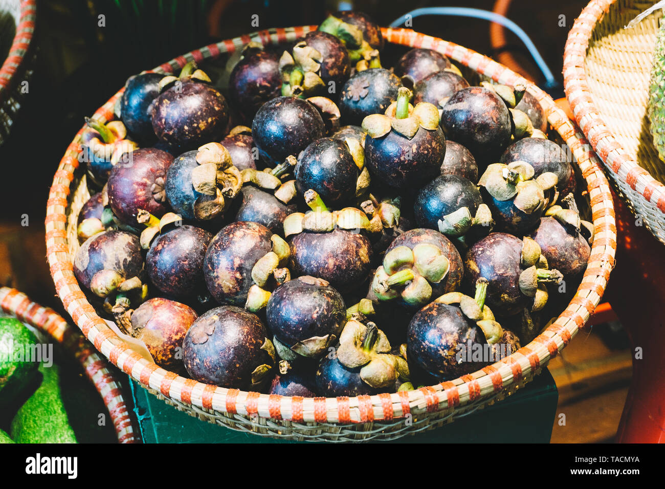Mangosteen fruit on the market. Tropical fruits of Thailand, Vietnam