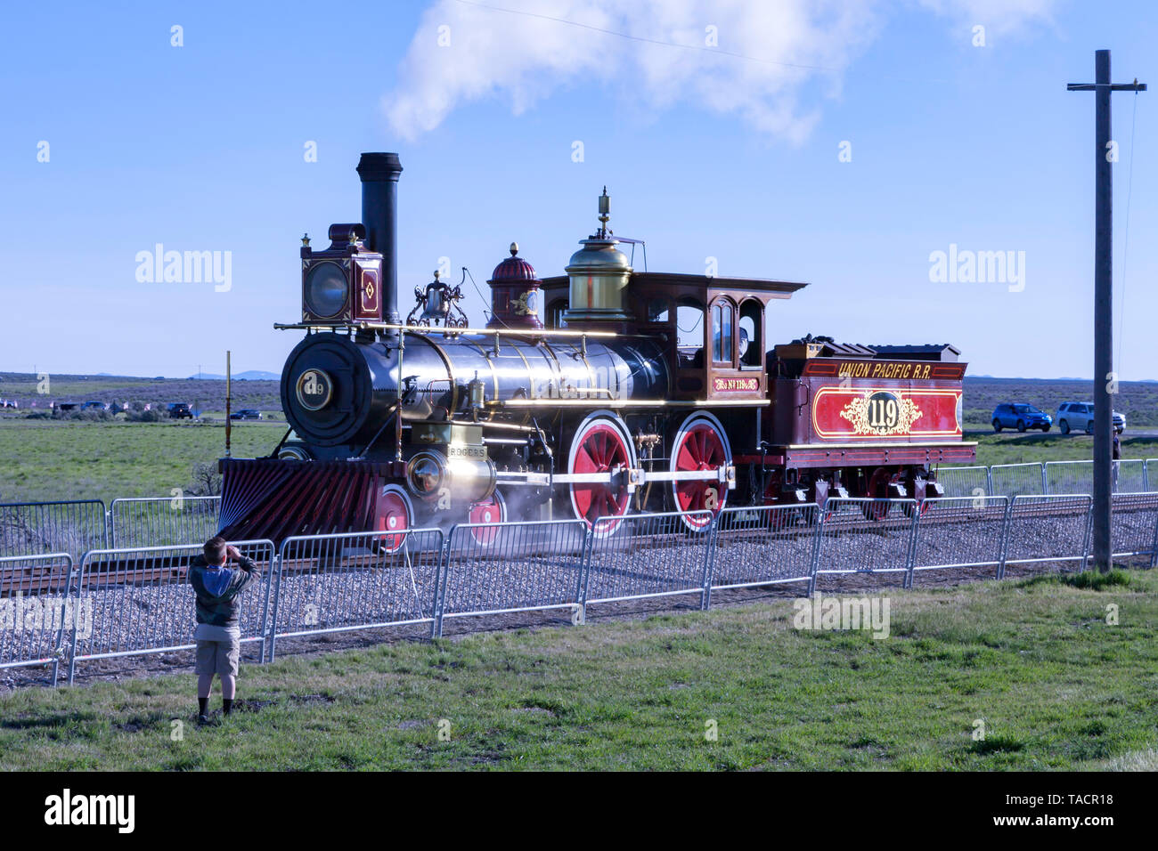 The Union Pacific Railroad's locomotive No. 119,  makes its way into position for the ceremonies celebrating the 150th anniversary of the completion o Stock Photo