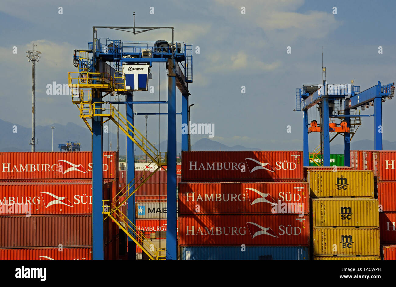 santos, brazil - 2014.02.08: containers of various shipping lines stacked on tecon  container terminal quay of santos port Stock Photo