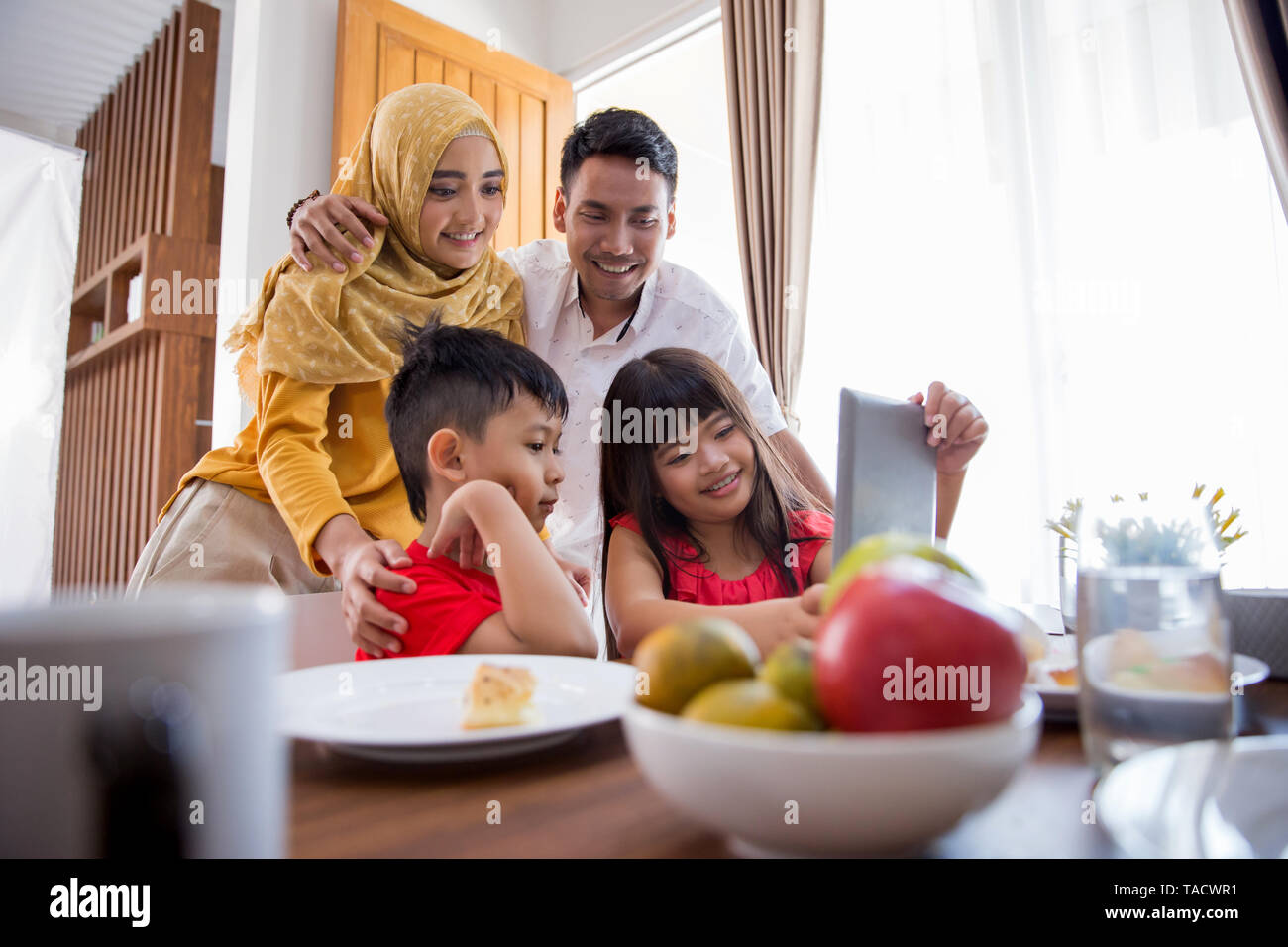 kids and parent using tablet pc Stock Photo