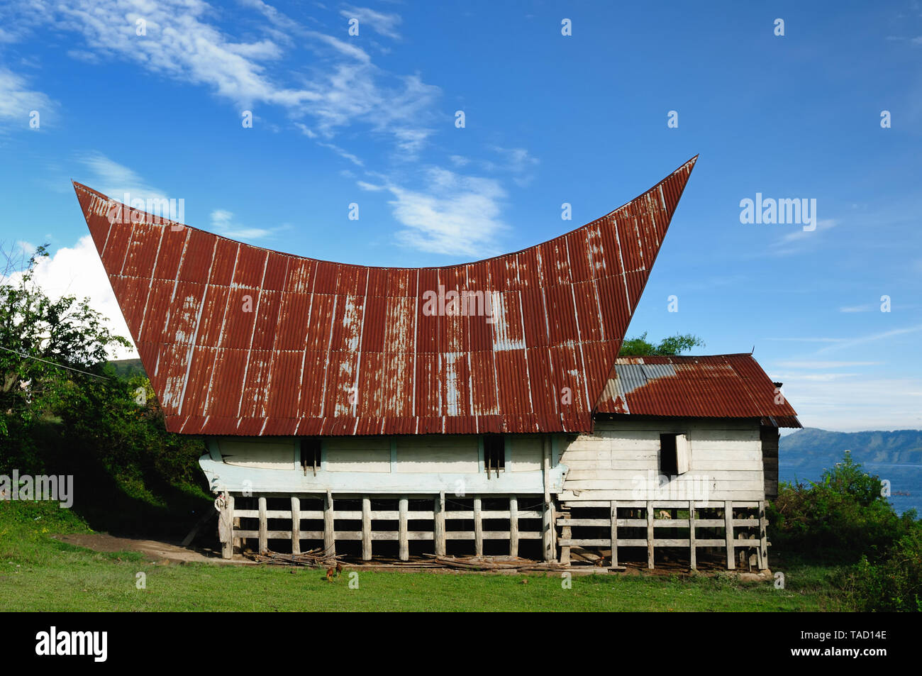 Traditional Batak style house at the Samosir island, Danau Toba, Indonesia, North Sumatra Stock Photo