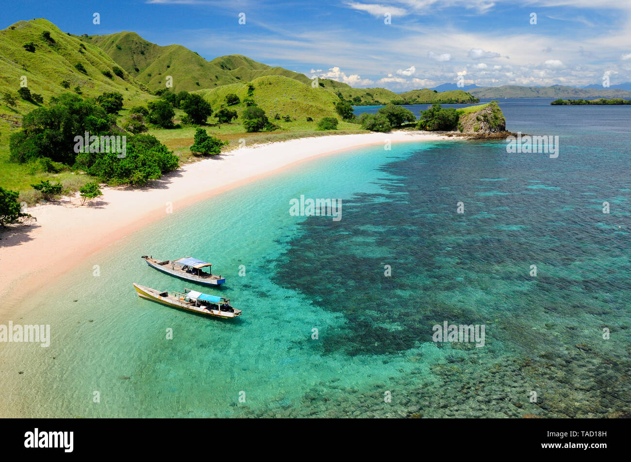 Beautiful Pink beach, one of the most beautful on tha World with pink sand and turquoise water in the national park on Komodo. Indonesia Stock Photo