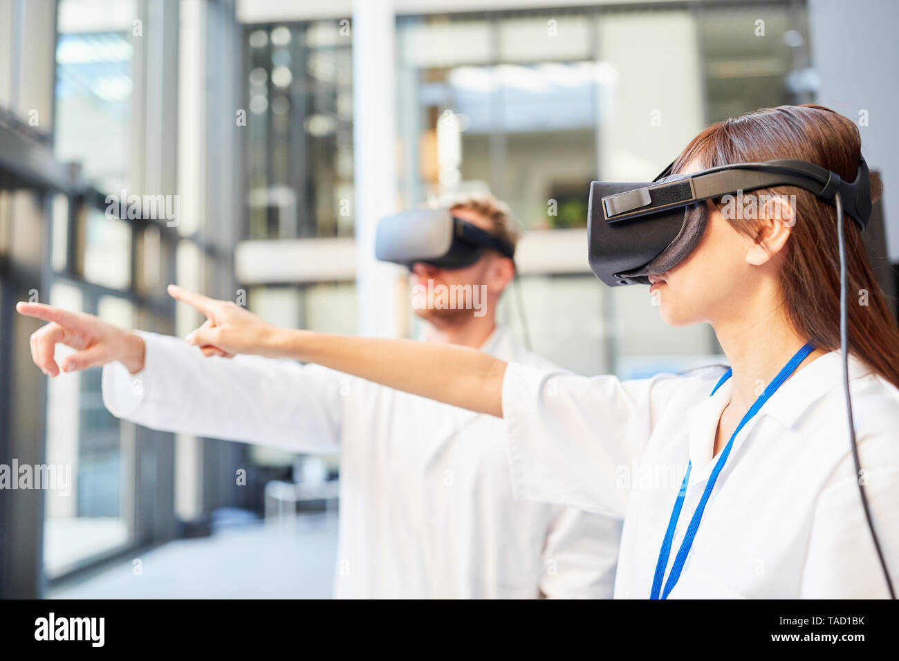 Doctors or scientists learn medicine in simulation with the Virtual Reality glasses Stock Photo