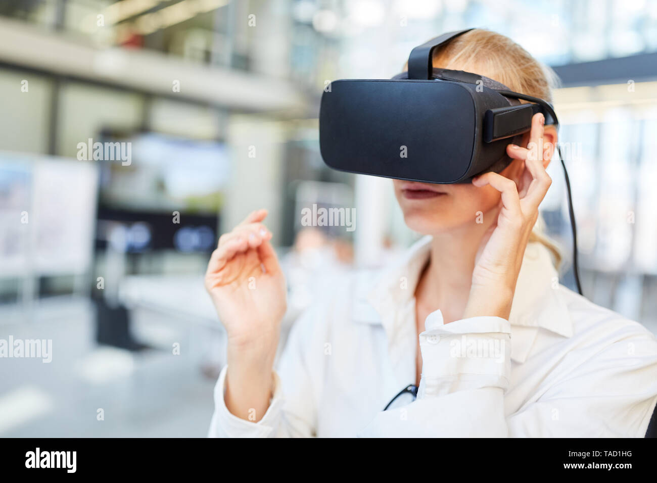 Doctor tests an innovative VR glasses for better diagnostics through visualization Stock Photo