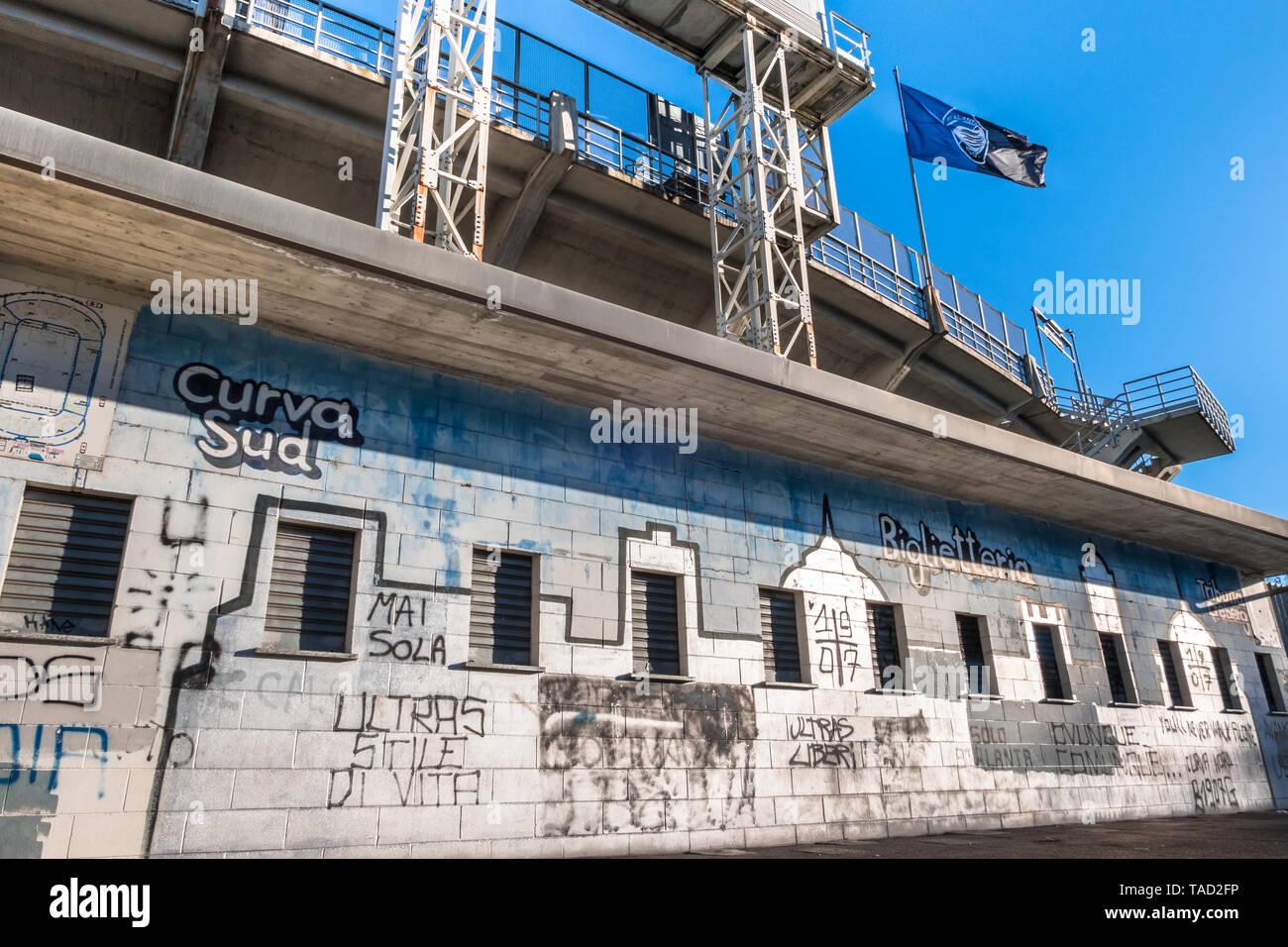 The Exterior Of The Football Stadium Where Atalanta Plays Atalanta Flag On The Old Wall Graffiti With The Text Biglietteria On Background A Blue Stock Photo Alamy