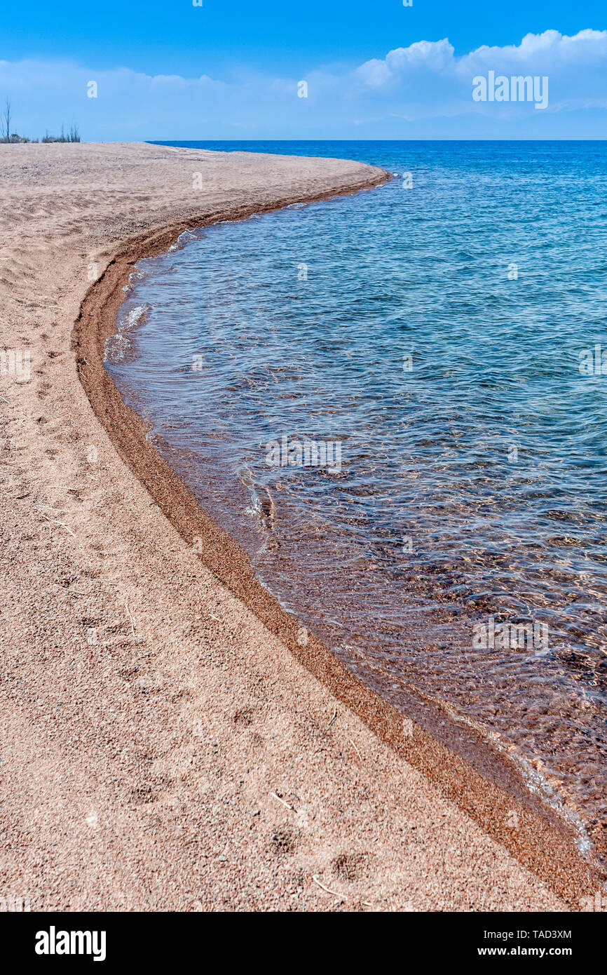 Abstract view of the southern shore of Lake Issyk Kul, Kyrgyzstan, Central Asia Stock Photo