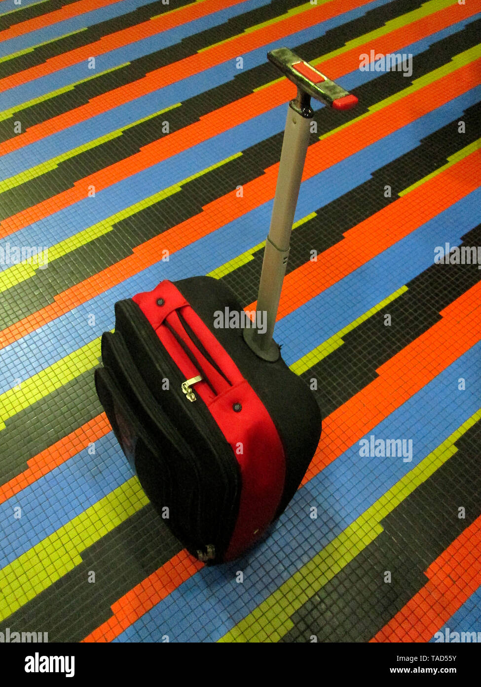 CARACAS, VENEZUELA. SUITCASE ON ICONIC FLOOR TRAVEL AND MIGRATION. Stock Photo