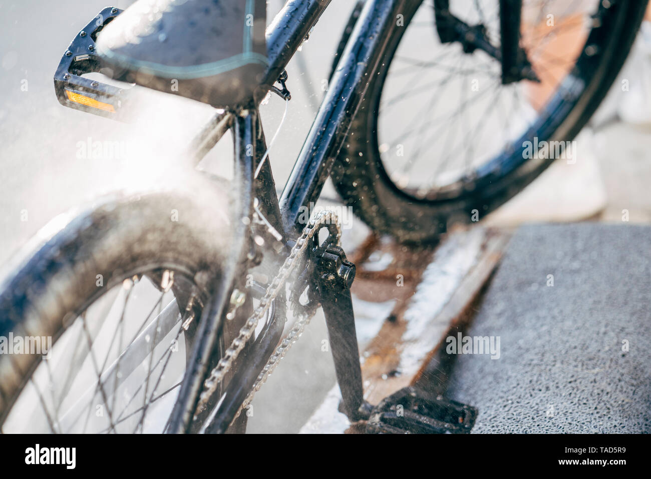 Washing bmx bike Stock Photo