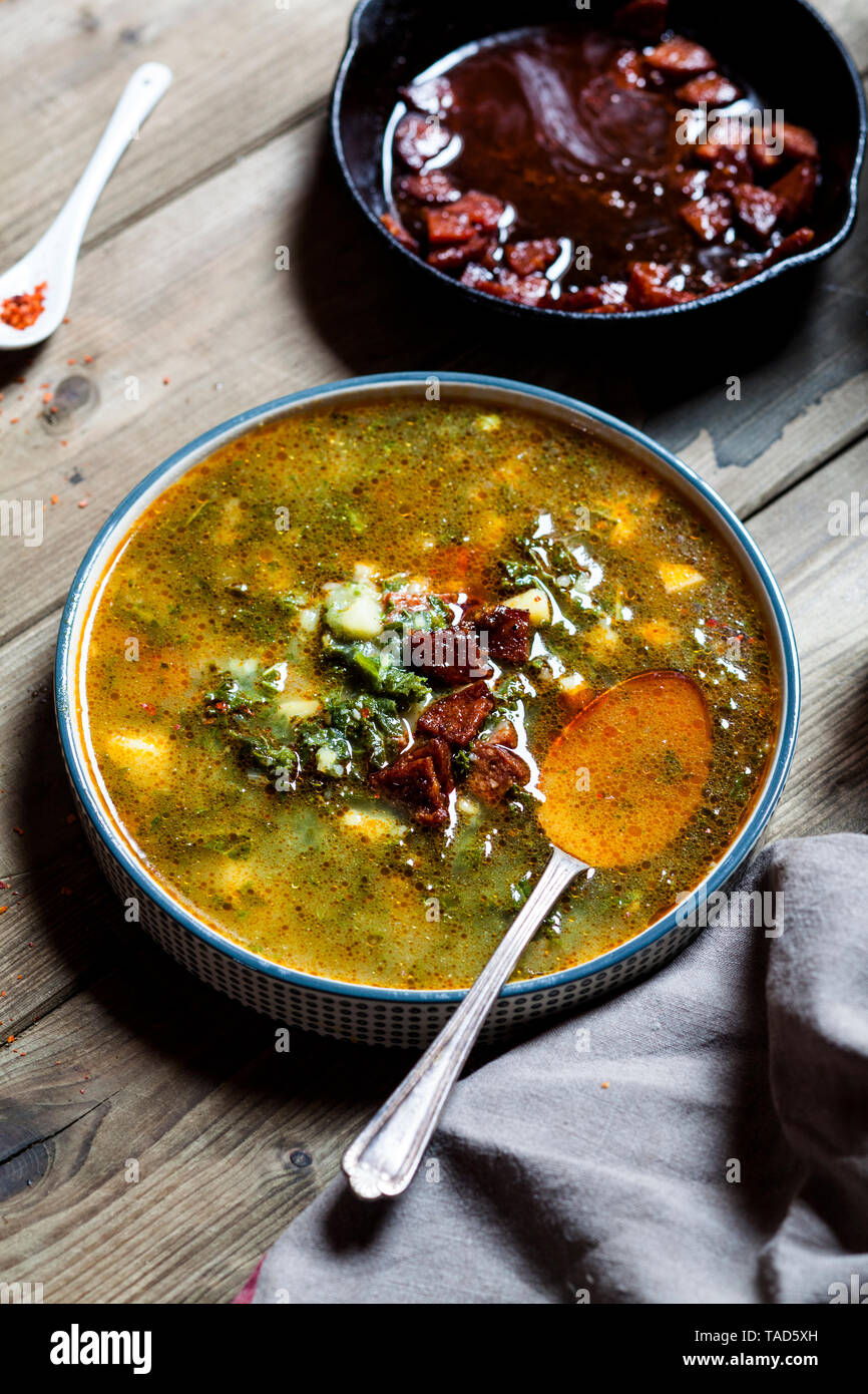 Caldo verde, soup with green cabbage, chorizo and potato Stock Photo