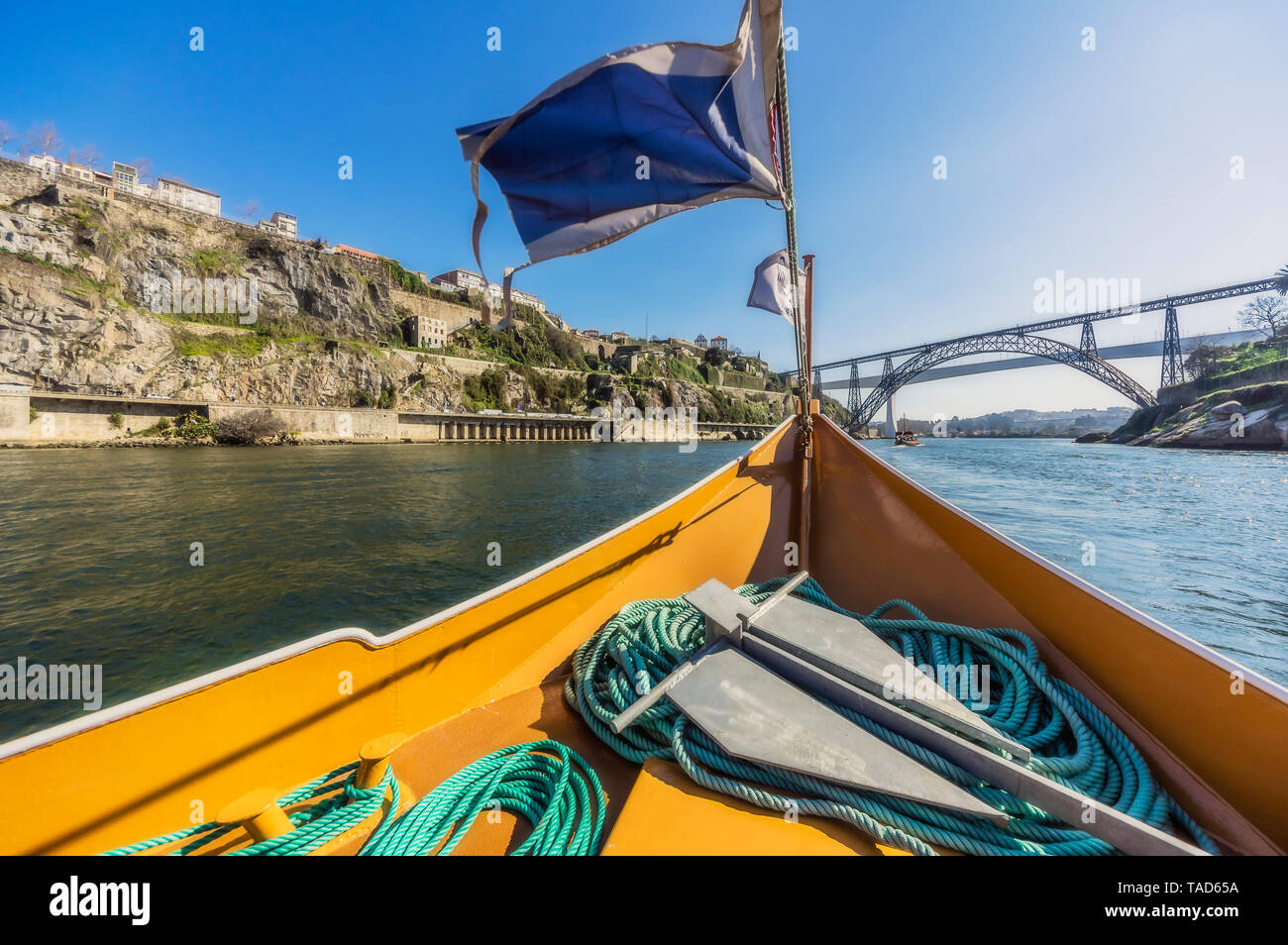 Portugal, Porto, Douro river, pleasure boat and Luiz I Bridge in the background Stock Photo