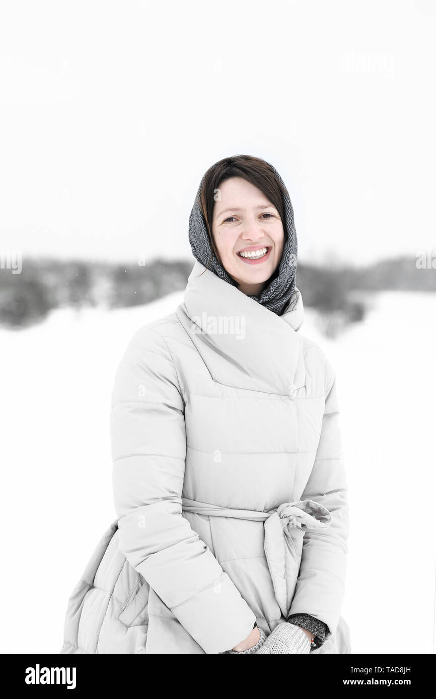 Woman standing happy winter hi-res stock photography and images - Alamy
