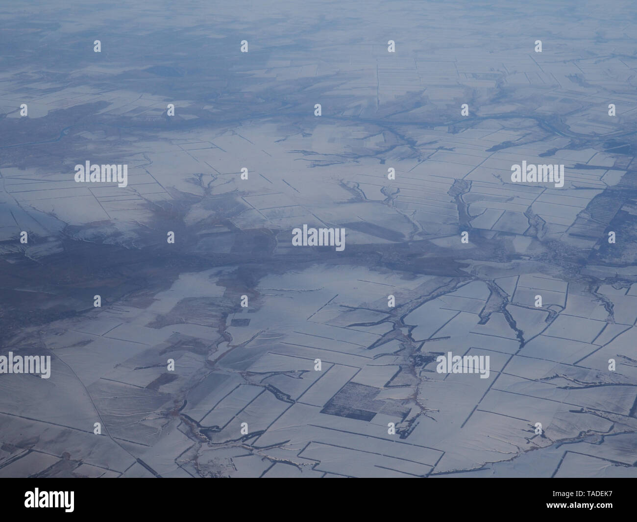 Aerial view of snowy mountains hi-res stock photography and images - Alamy