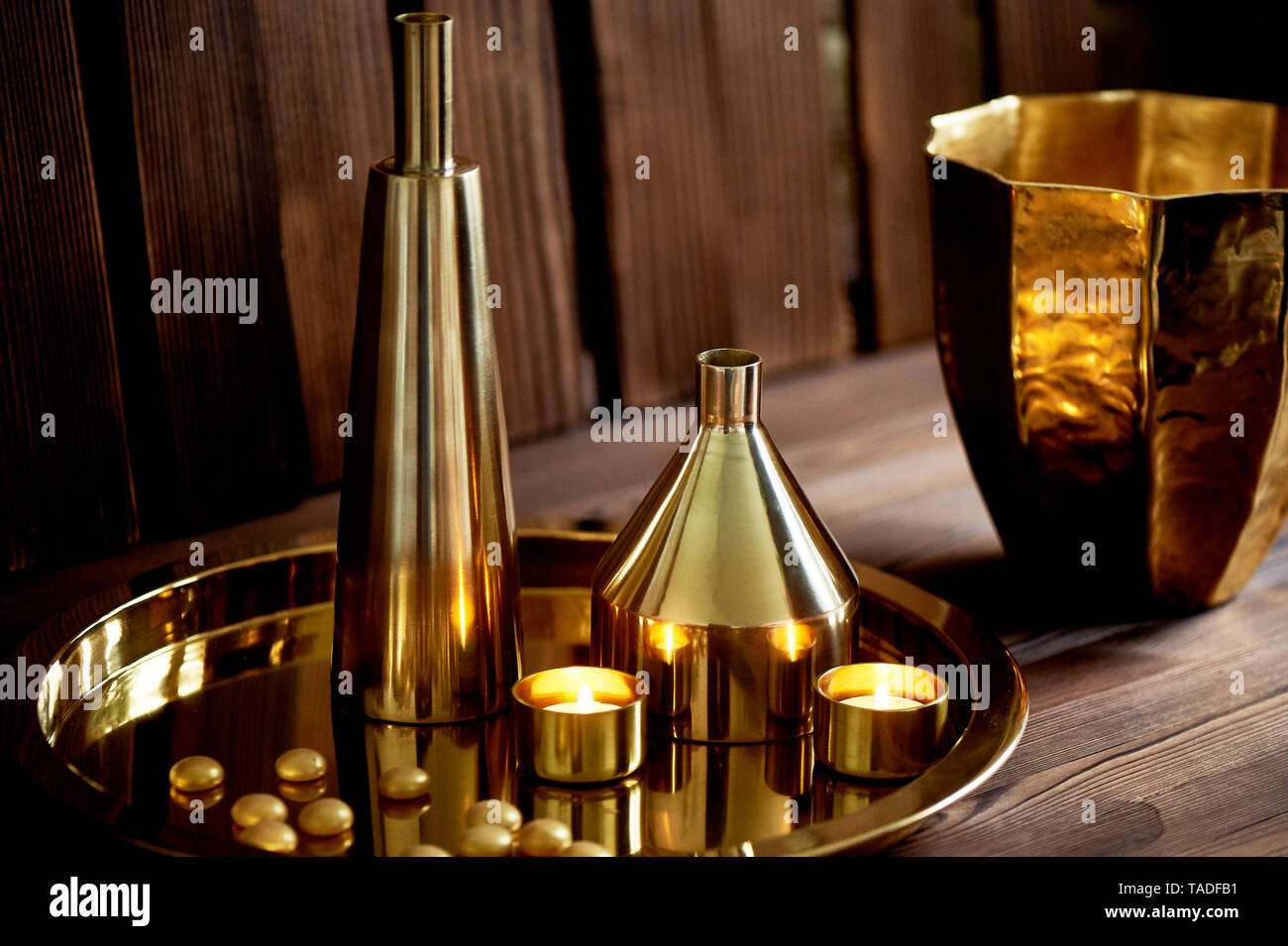Cozy decor.Gold , burning candles, Golden vessels Stock Photo Alamy