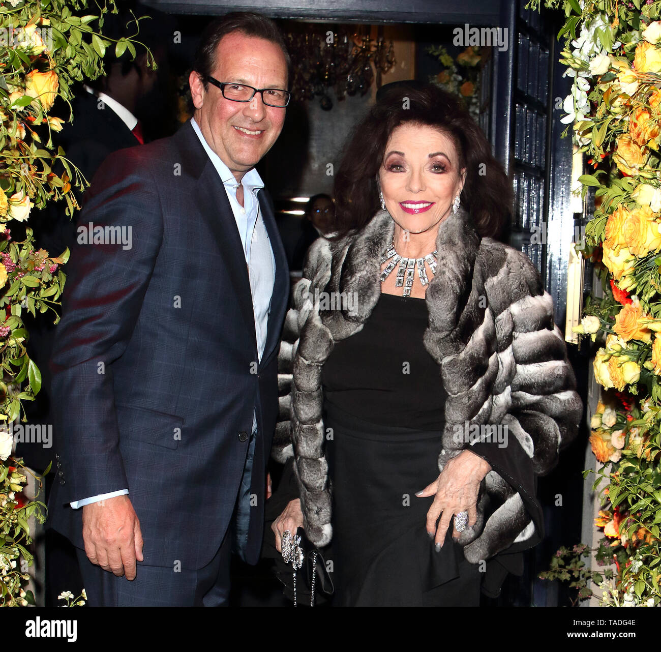 Dame Joan Collins and Percy Gibson seen during the Tramp Nightclub 50th