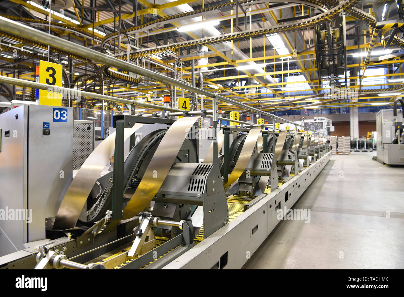 Machines for transport and packaging in a printing shop Stock Photo Alamy