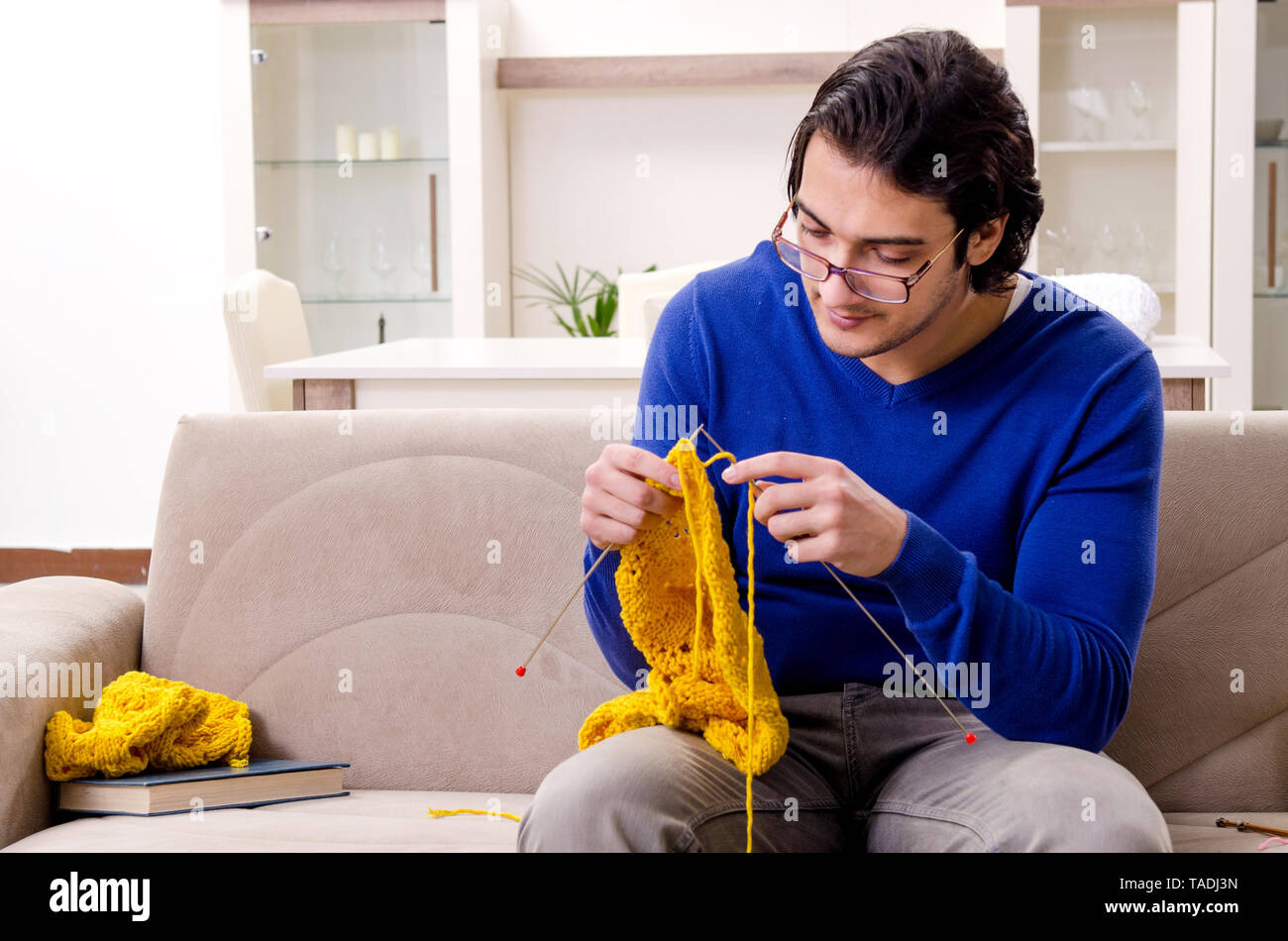 young-good-looking-man-knitting-at-home-stock-photo-alamy