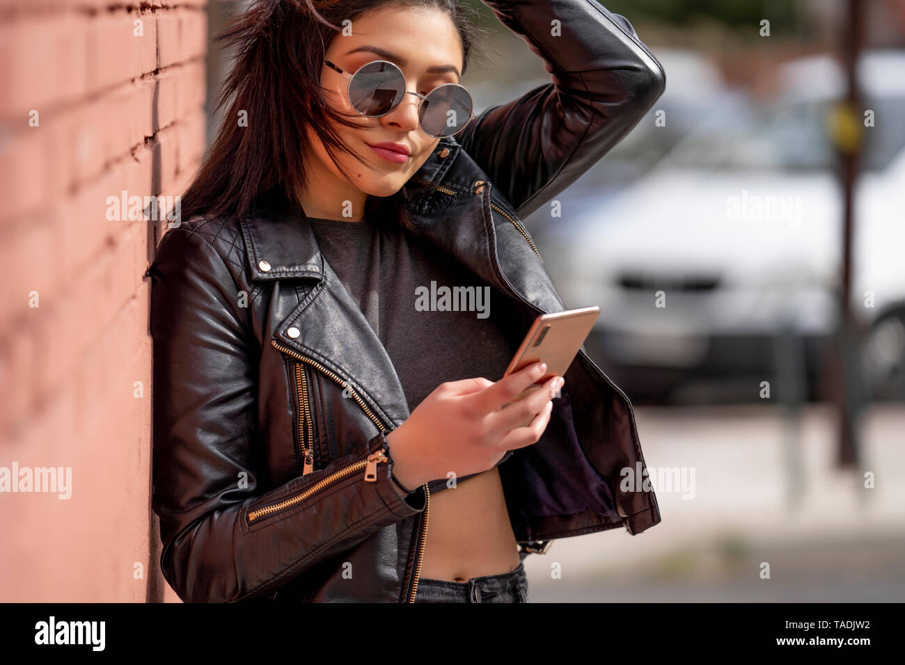 Black Leather Jacket Sunglasses High Resolution Stock Photography and