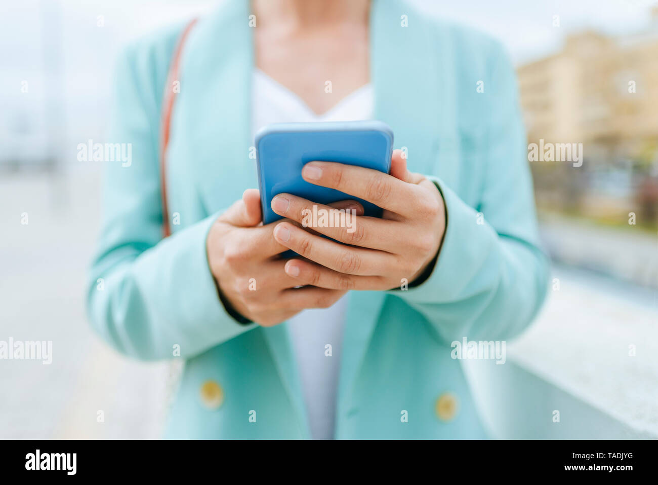 Close-up of woman's hands with smartphone Stock Photo