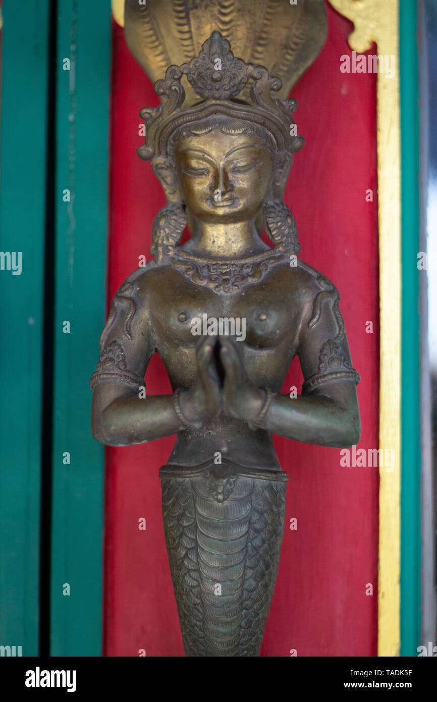 Mermaid bronze statue praying with anjali mudra hands in buddhist