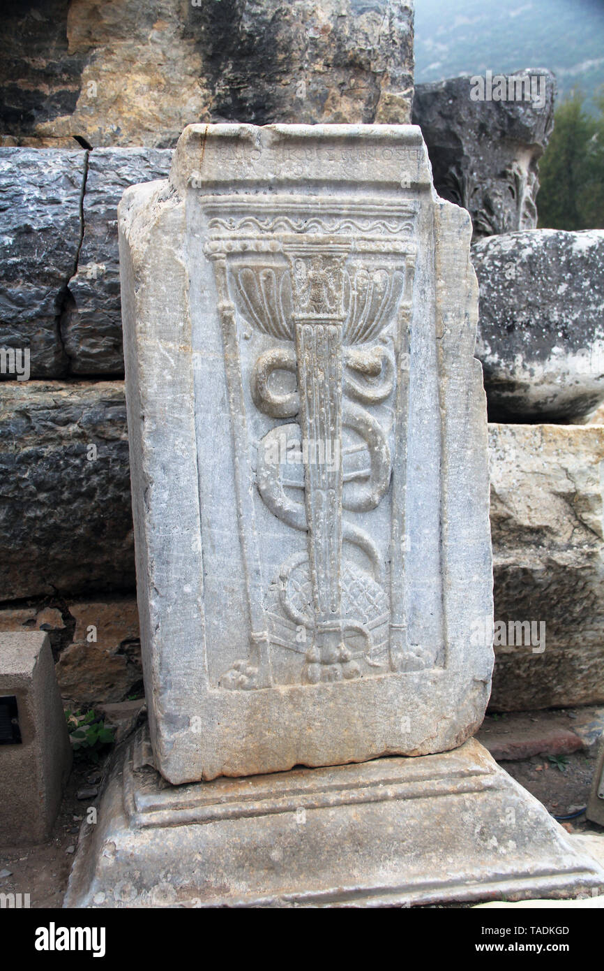 Archaeological Ruins of a Caduceus in Ephesus, Turkey Stock Photo