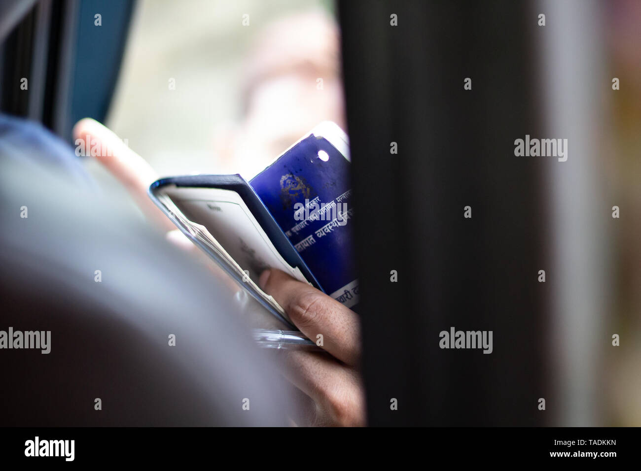 Hands holding Nepali passports Stock Photo Alamy