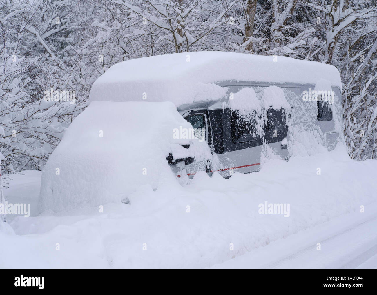 Germany, Geretsried, camper, snowed up Stock Photo
