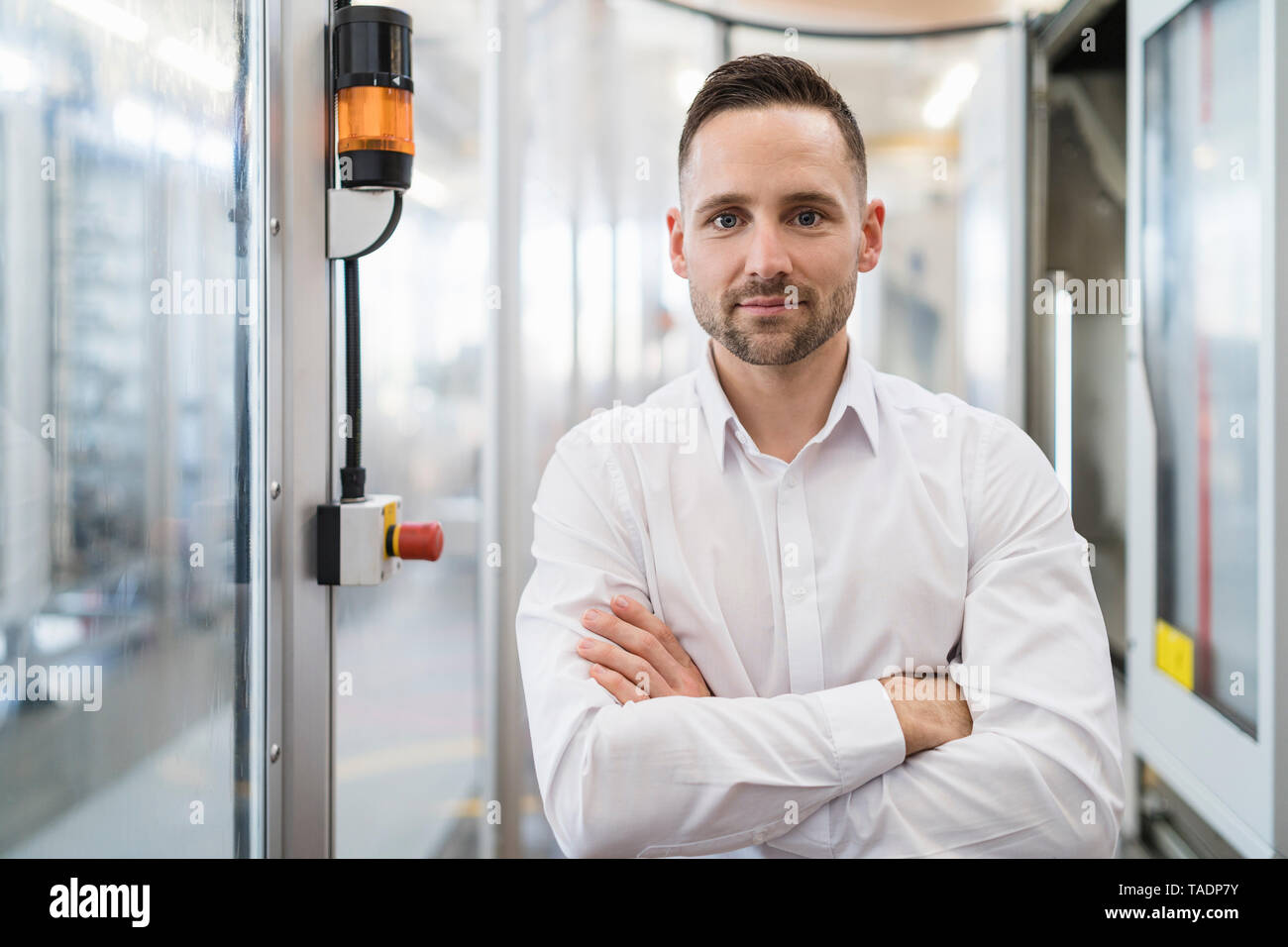 Portrait of confident businessman in a modern factory Stock Photo