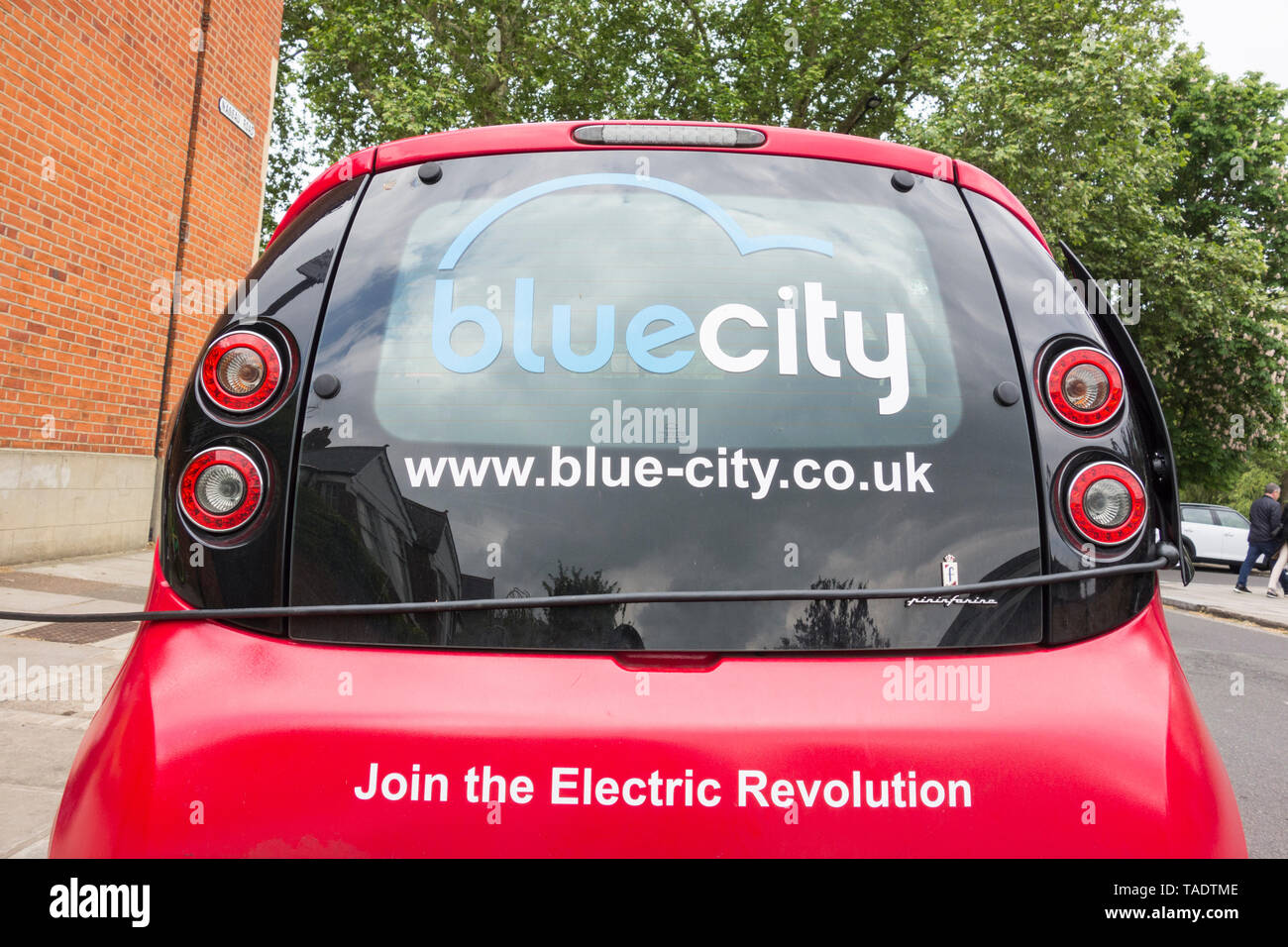 Blue City 100% Electric car-sharing scheme and bay Stock Photo