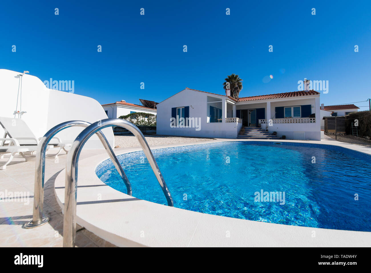 Portugal, Mediterranean house with swimming pool Stock Photo Alamy