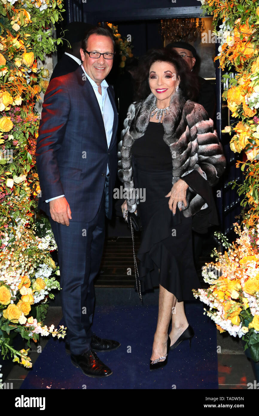 Joan Collins and Percy Gibson, Tramp 50th Anniversary Summer Party