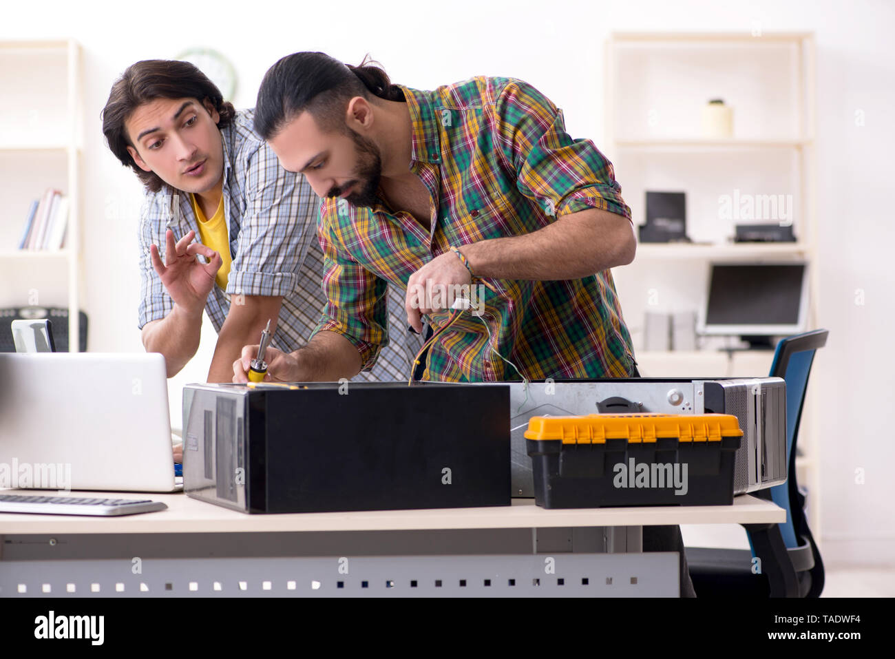 IT engineers working on hardware issue Stock Photo