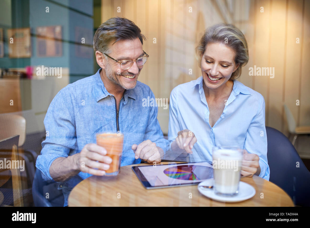 Happy man woman using hi-res stock photography and images - Alamy