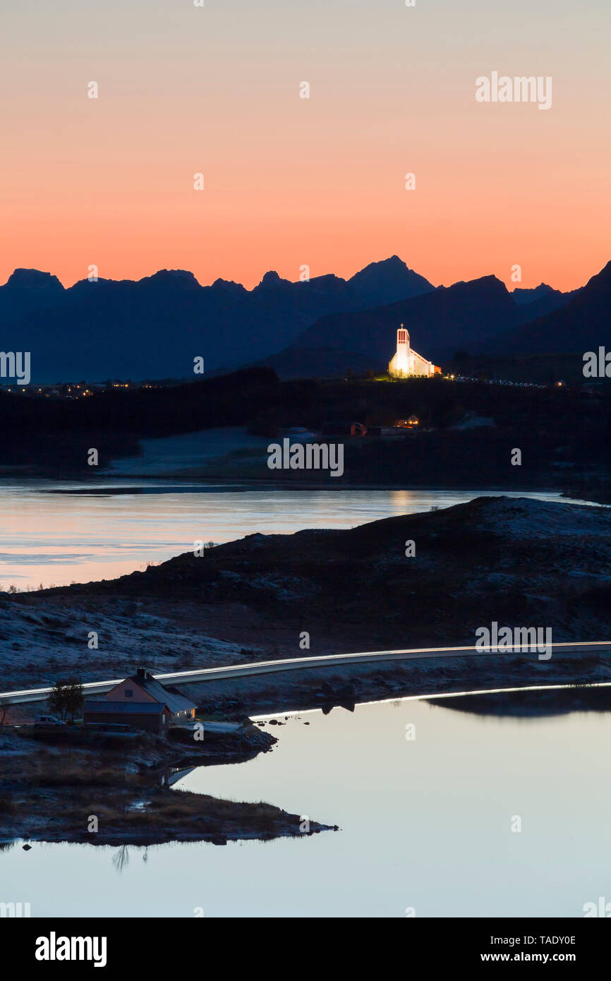 Norway, Lofoten Islands, Leknes, view to illuminated church Stock Photo