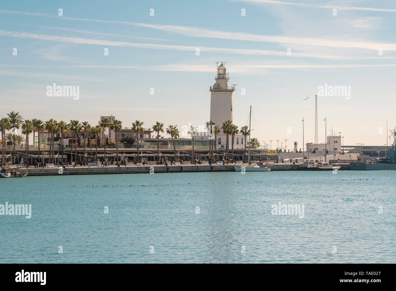 Spain, Malaga, view of the harbor with lighthouse Stock Photo