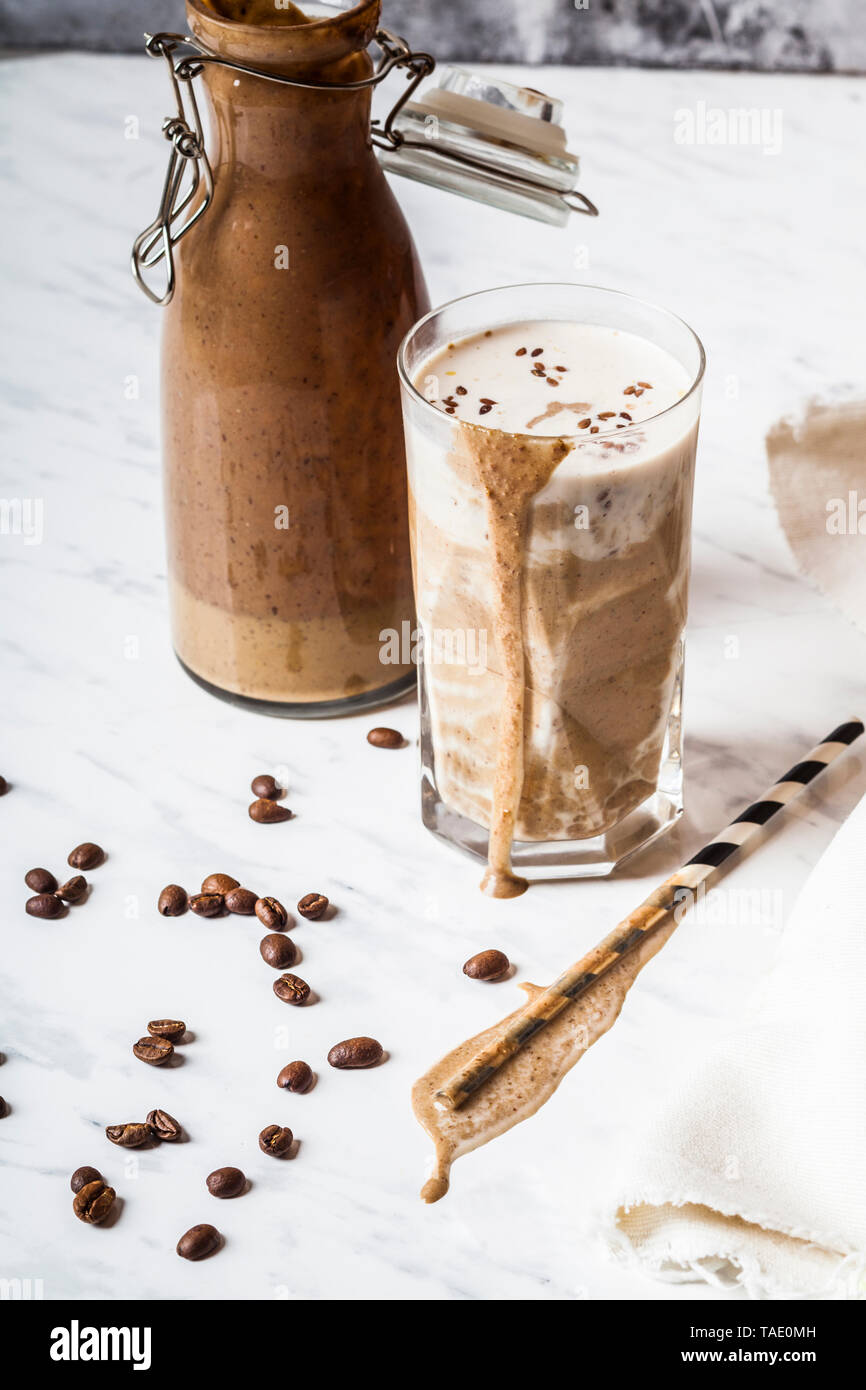 Sugarfree wake-up smoothie with banana, jogurt, coffee and linseeds ...